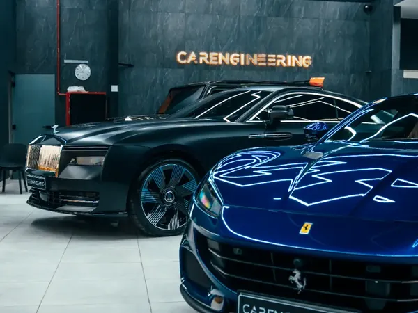 Rolls-Royce and Ferrari at the studio